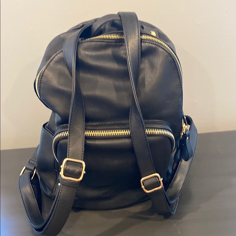 MMS Black Backpack with Gold Accents